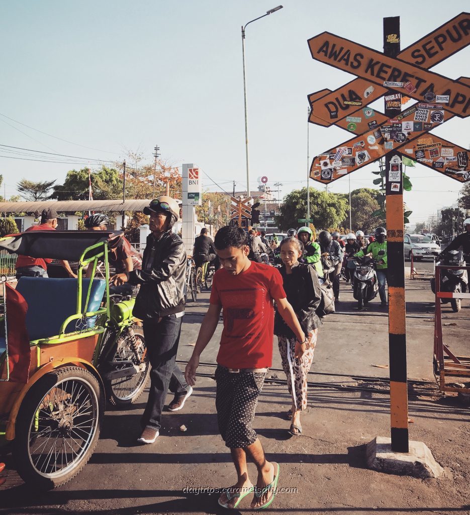 The Rush At The Malioboro Road Level Crossing