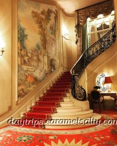 A Grand Staircase at the Ritz Hotel on Piccaddiily